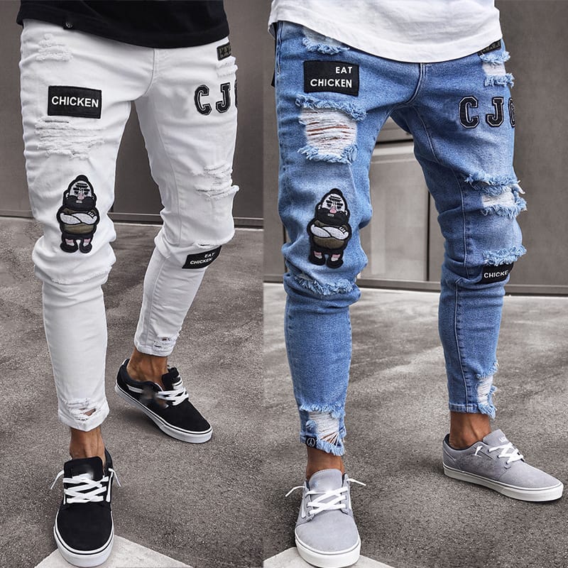 European and American Men's Ripped Jeans Y2K Personality Trend Slim Knee Ripped Peanuts Zipper Badge Patchwork Denim Trousers